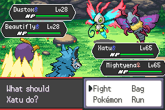 Xatu and Mightyena facing Dustox and Beautifly in a Double Battle